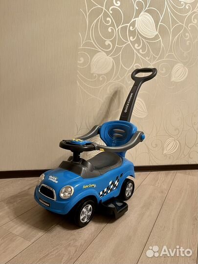 Машинка каталка с ручкой