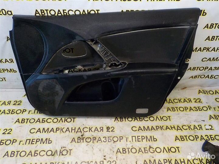 Обшивка двери передней правой Toyota Avensis III