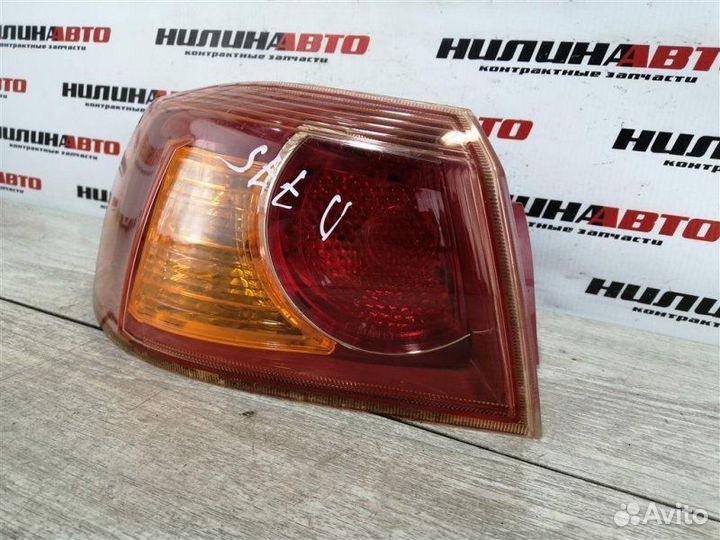 Фонарь левый Mitsubishi Lancer 10 1.5 2009