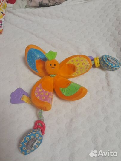 Игрушка на коляску