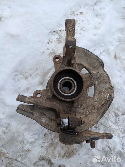 Кулак поворотный левый Hyundai Sonata 6 YF