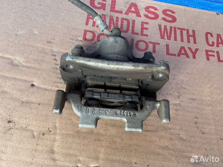 Суппорт задний правый Nissan Maxima A35 VQ35DE