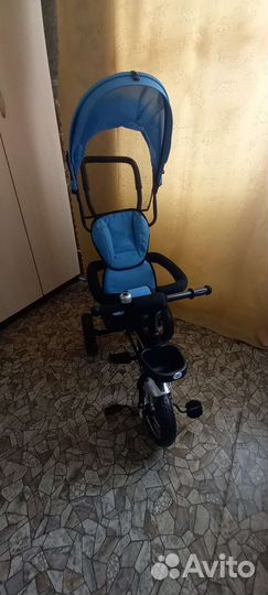 Трехколесный велосипед с ручкой