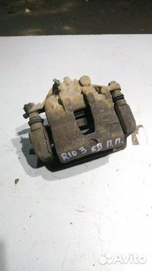 Суппорт тормозной передний правый Kia Rio 3 2013