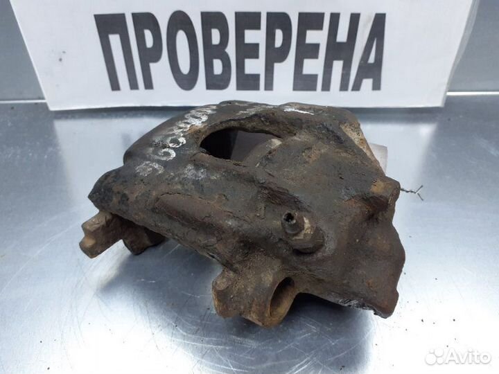 Суппорт тормозной передний левый