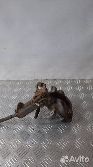 Суппорт тормозной задний левый Toyota Avensis