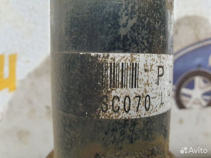 Амортизатор передний левый Subaru Forester 3