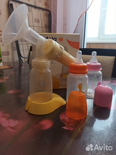 Молокоотсос medela ручной