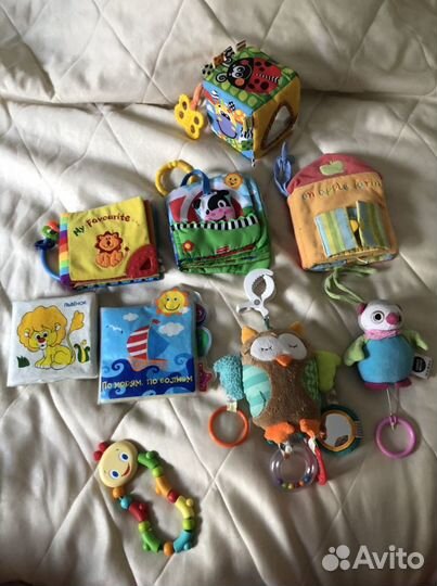 Игрушки погремушки до двух лет
