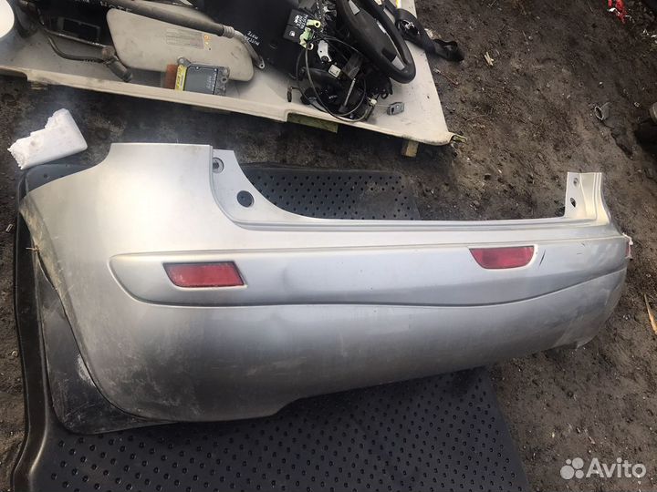 Бампер задний Nissan Note E11