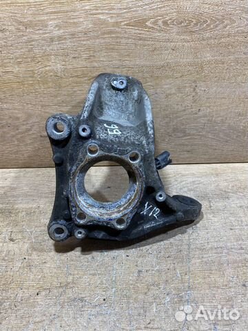 Поворотный кулак левый VW Passat B6 X12