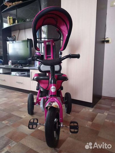 Трехколесный велосипед с ручкой