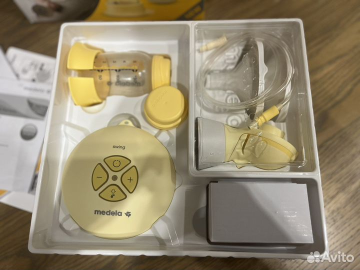 Молокоотсос medela swing flex электрический
