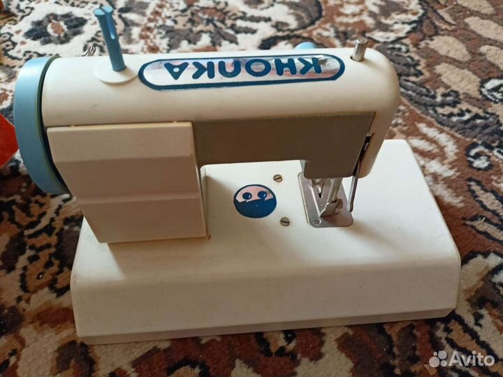 Швейная машинка Кнопка