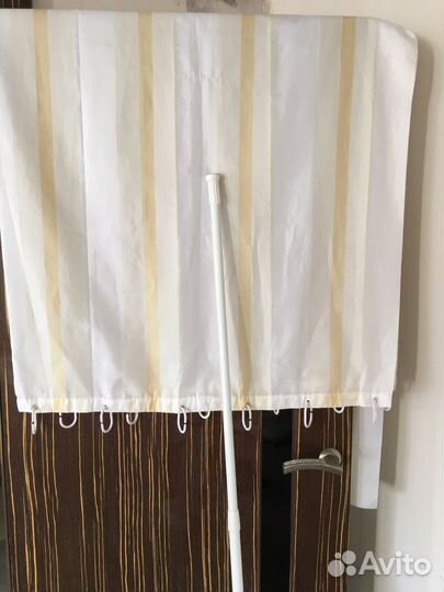 Занавеска для ванной и телескопический карниз