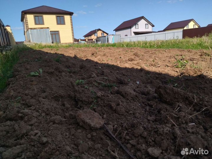 Вспашка земли трактором нарезка гряд доминатор