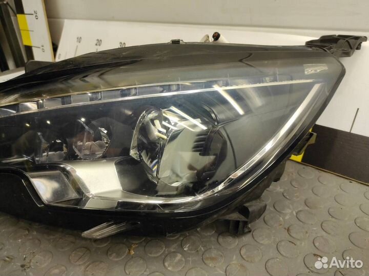 Фара левая Peugeot 308