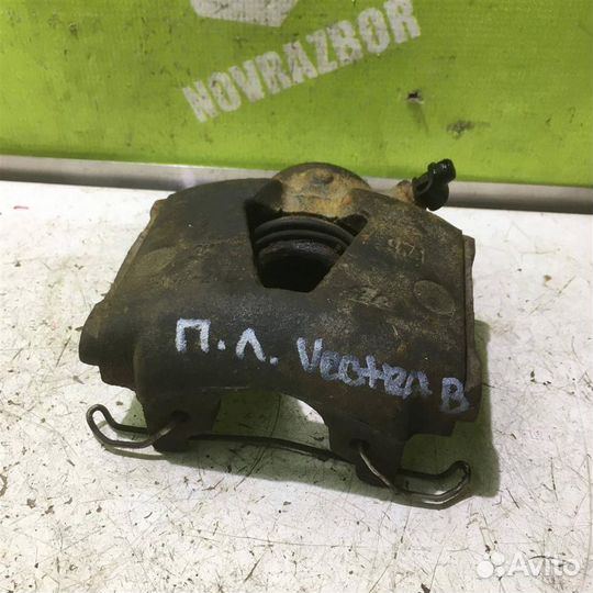 Суппорт передний левый Опель Вектра Б