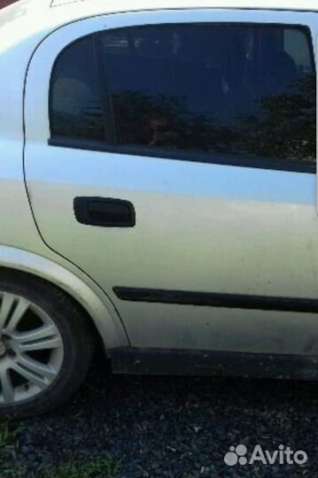 Правая задняя дверь на opel astra G