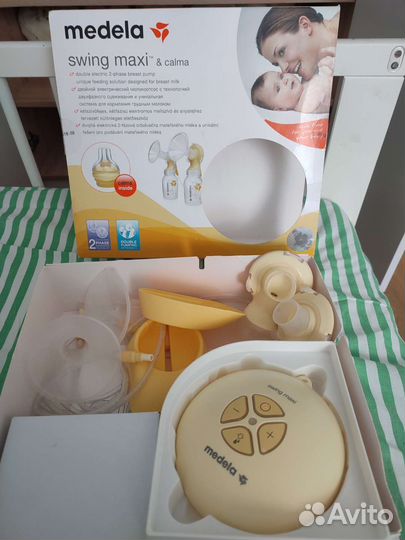 Молокоотсос medela swing flex электрический