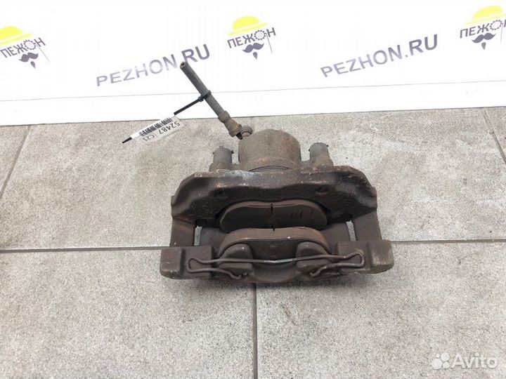 Суппорт тормозной передний левый Ford Focus