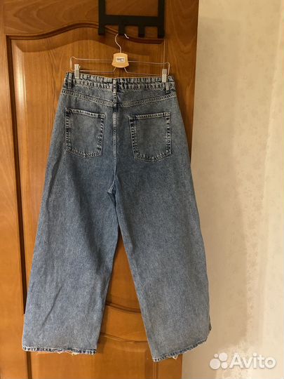 Джинсы клеш