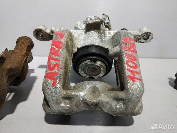 Суппорт задний левый Opel Astra J хэтчбек A14NET