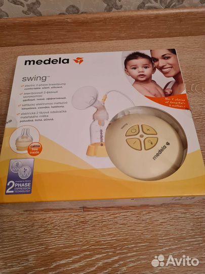Молокоотсос medela swing электрический