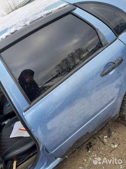 Дверь задняя левая Калина 1118