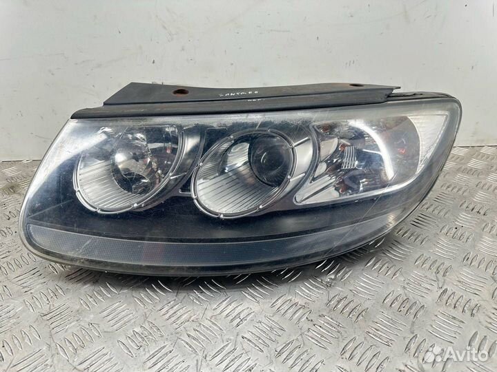 Фара левая Hyundai Santa Fe (SM) рест. 2007