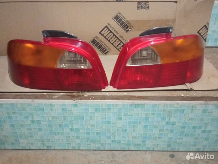 Задние фонари авенсис т220
