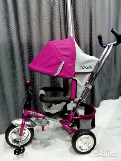 Трехколесный велосипед с ручкой