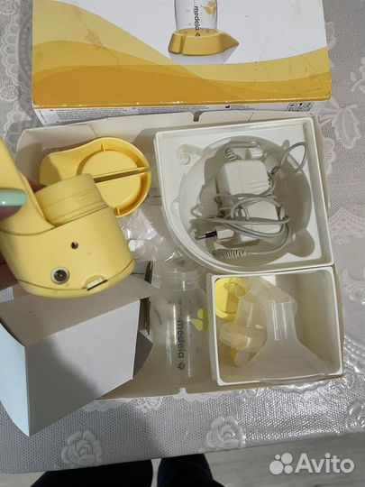 Молокоотсос medela электрический