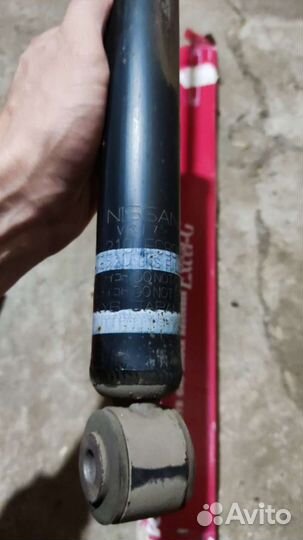 Амортизатор задний Nissan Tiida C11 оригинал