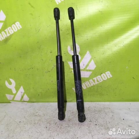 Амортизатор крышки багажника Митсубиси Лансер 10