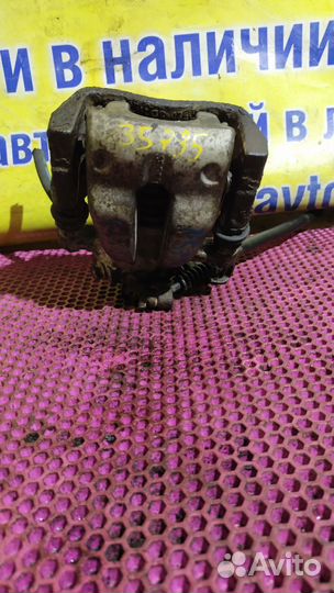 Суппорт тормозной задний правый Opel Astra