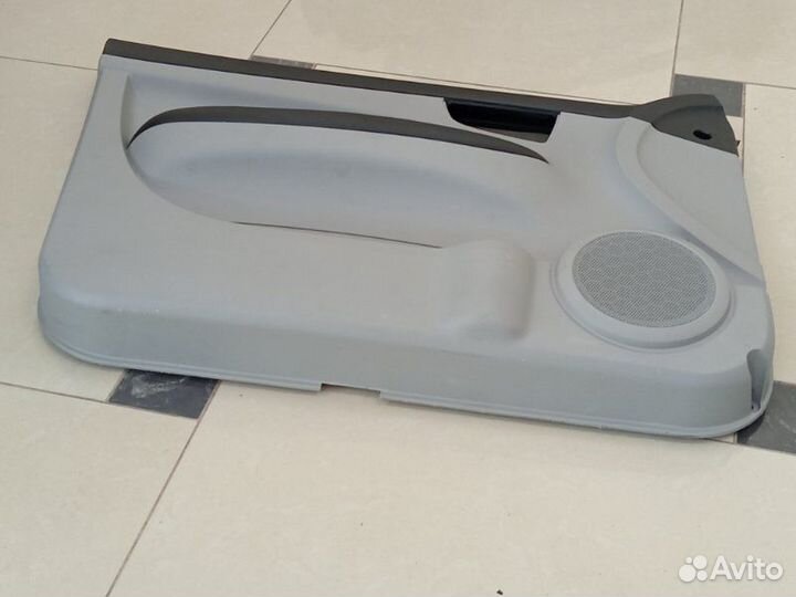 Обшивка двери передняя левая Тагаз Вега C100 2009