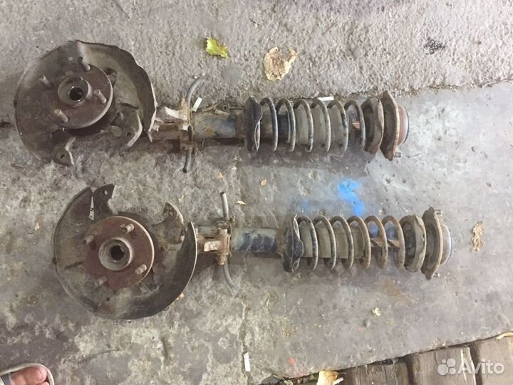 Передние стойки mazda 121