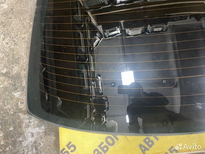 Стекло заднее Nissan Almera N16