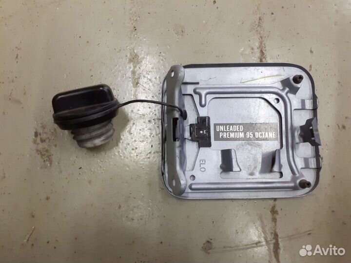 Лючок бензобака Nissan Tiida