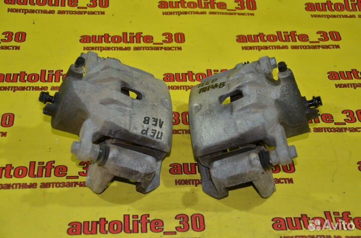 Суппорт тормозной передний Kia Cerato 3