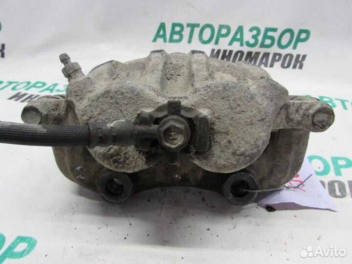 Суппорт передний левый для Nissan R'nessa 1997-20