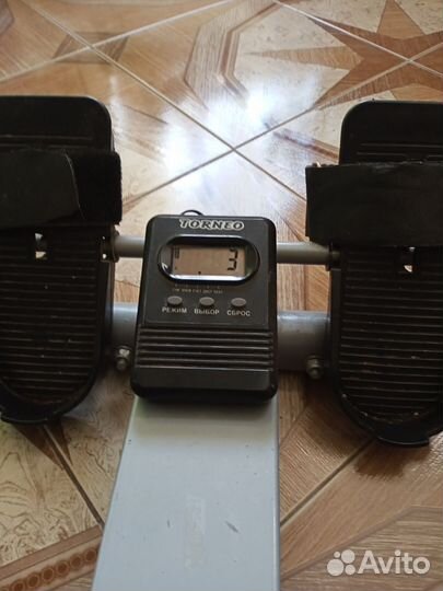 Гребной тренажер torneo