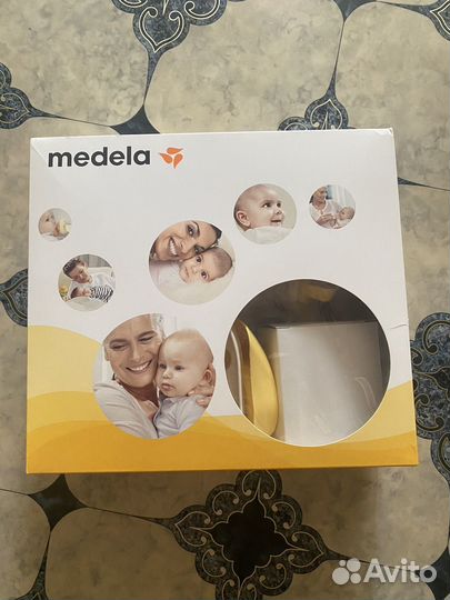 Молокоотсос medela swing