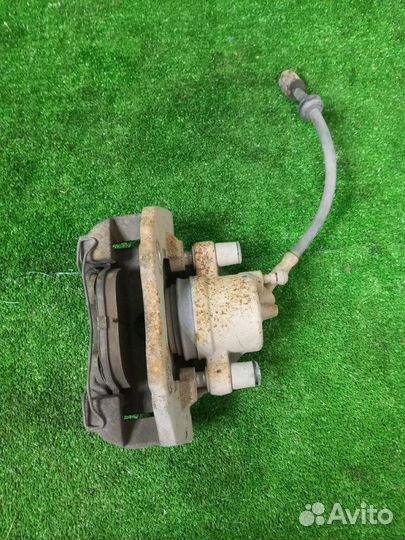 Суппорт тормозной передний левый Ford Focus DA3