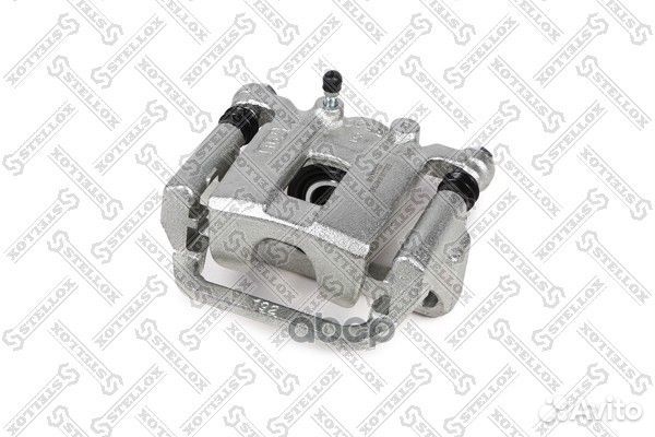 05-90573-SX суппорт тормозной задний левый Nis