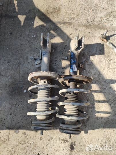 Стойка амортизатора передняя Peugeot 307 хэчбег