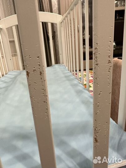 Детская кроватка с маятником и ящиком