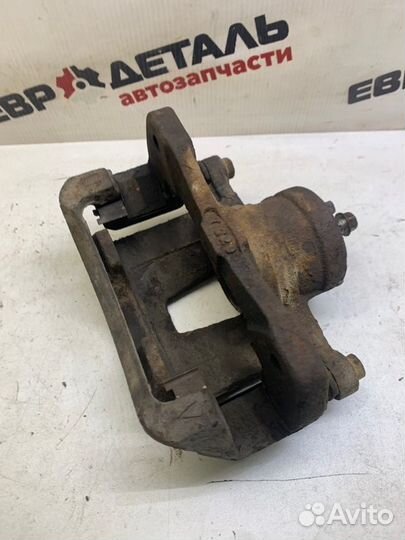 Суппорт тормозной передний левый Chevrolet Lacetti