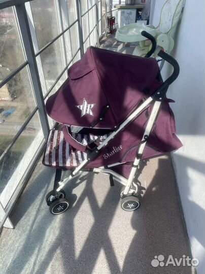 Прогулочная коляска трость
